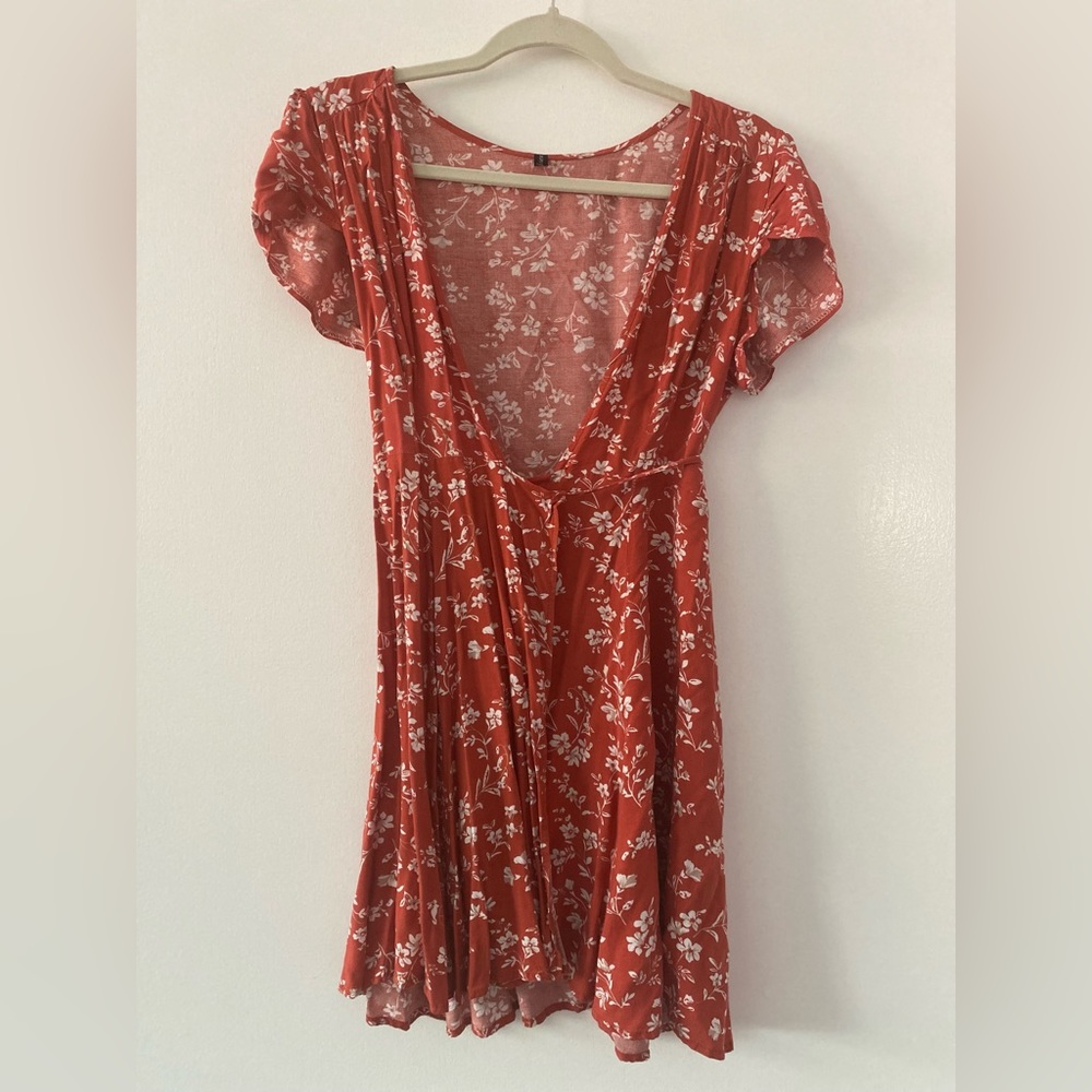 Wrapped floral orange dress